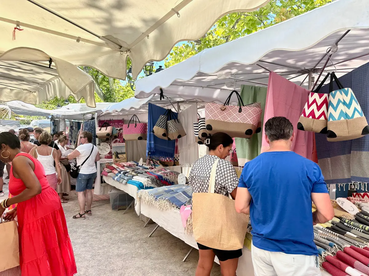 shoppers at the saint tropez weekly market