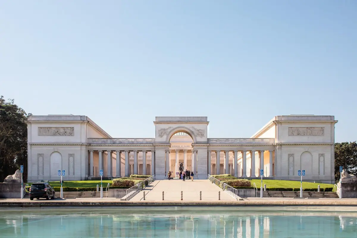 the legion of honor museum entrance from the pond