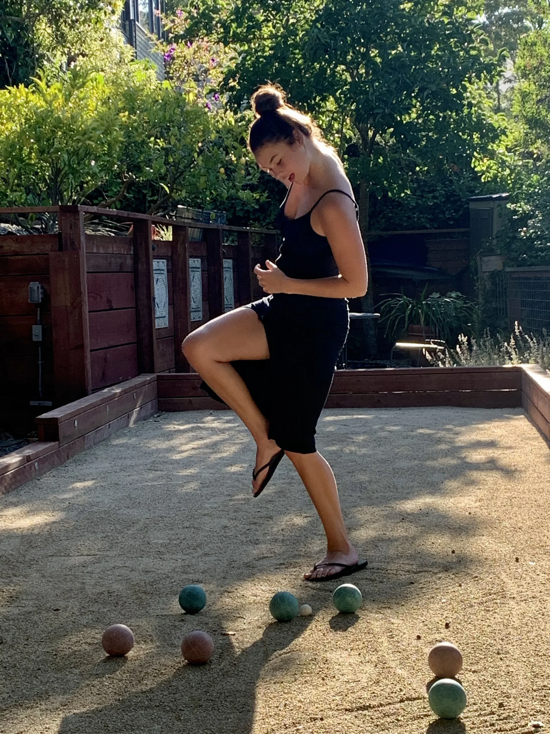  Chloe getting silly in our backyard pétanque court