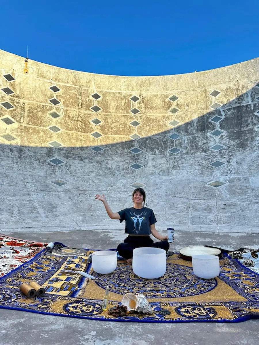inside the copa del sole in careyes with rugs, sound bowls and an instructor