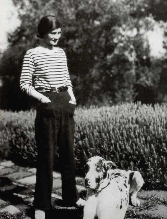Coco Chanel wearing a striped French breton shirt