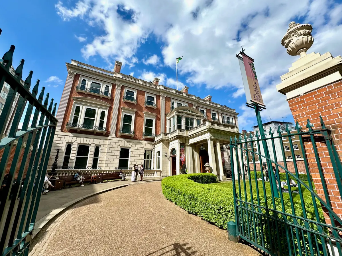 walking into the wallace collection museum on a sunny day in marylebone
