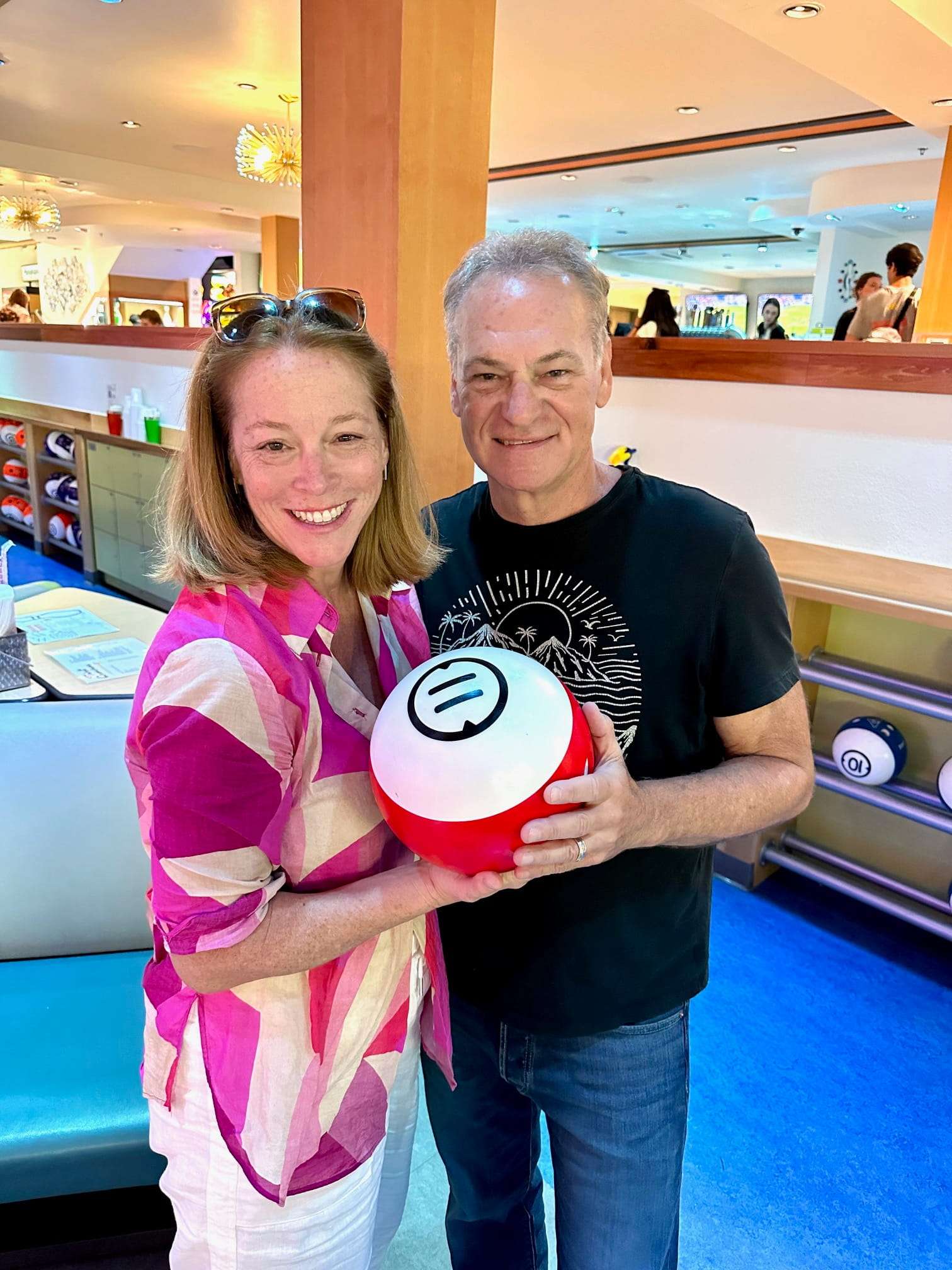 Couple holiding a bowling ball at Incline Bowl in Lake Tahoe