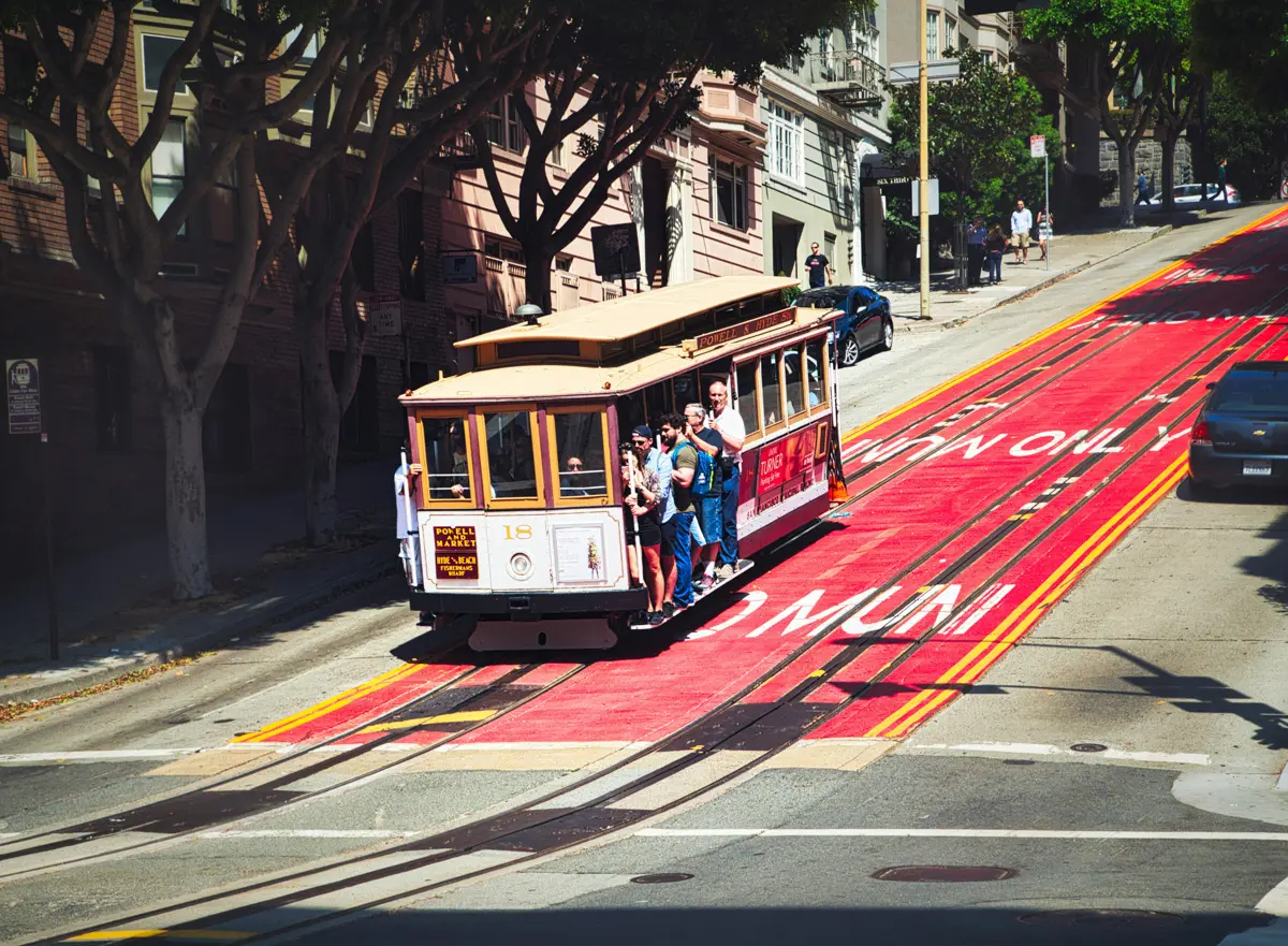 riding the cable car down a hill in san francisco is easier than driving