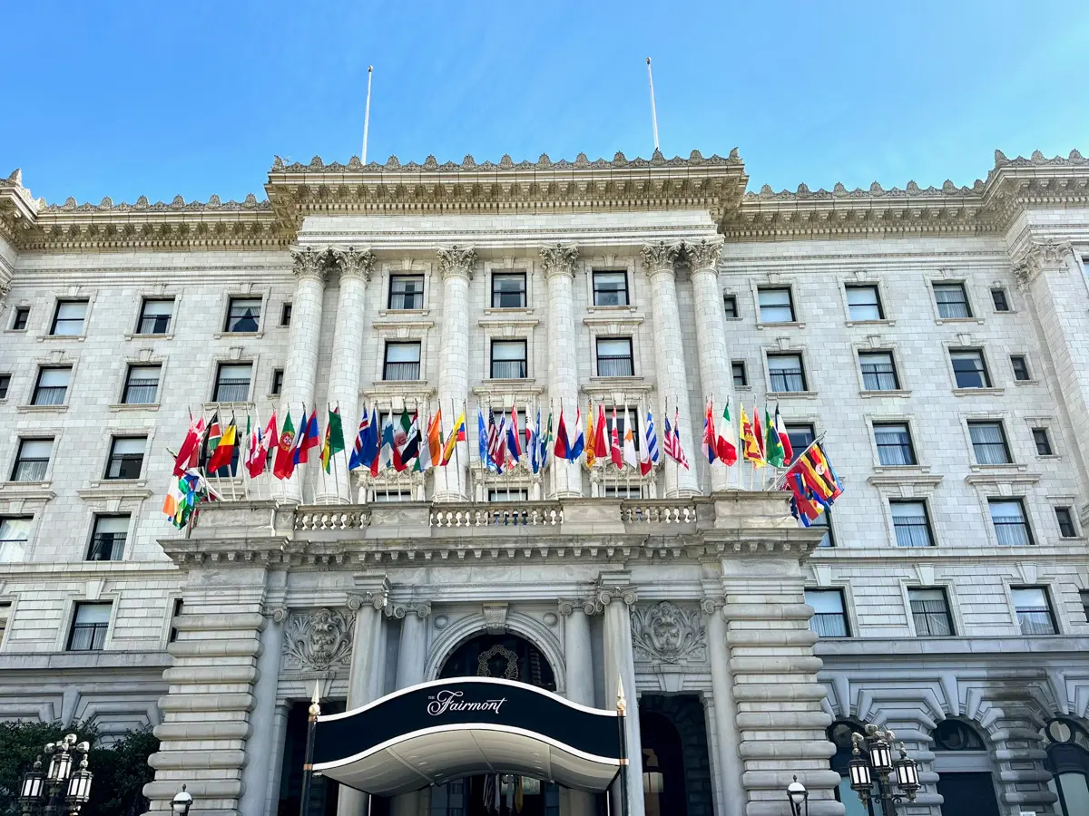 facade of the fairmont hotel san francisco with world flags