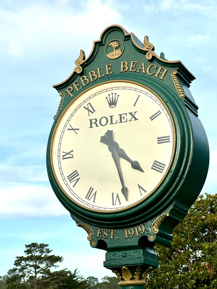 green rolex clock at pebble beach golf course