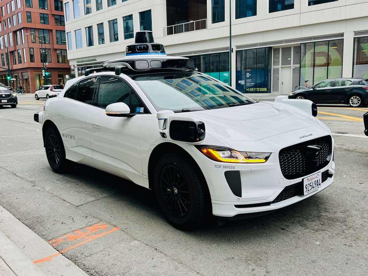 A Waymo driverless car in San Francisco with cameras and senosrs