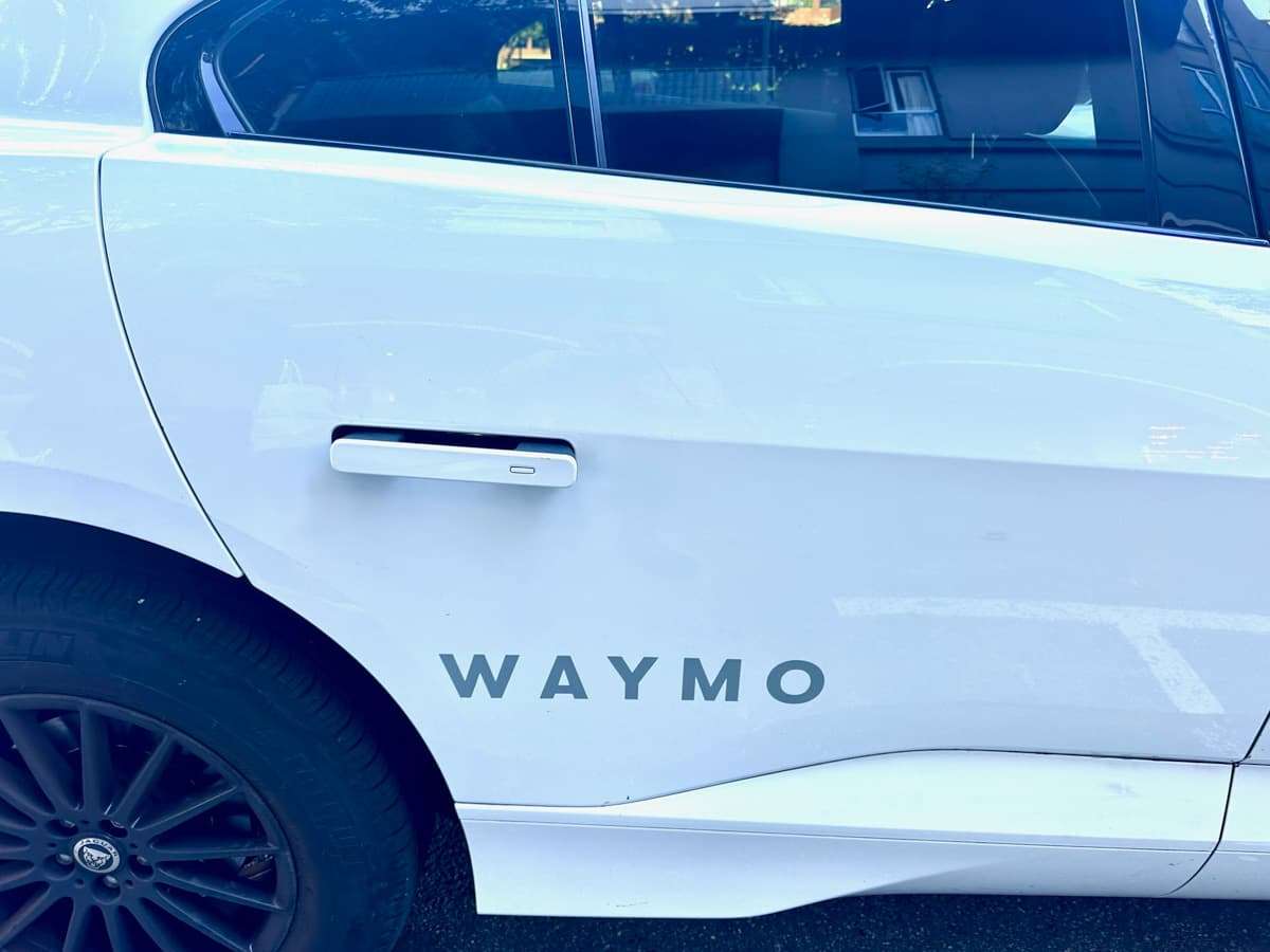 Waymo door handle popped open