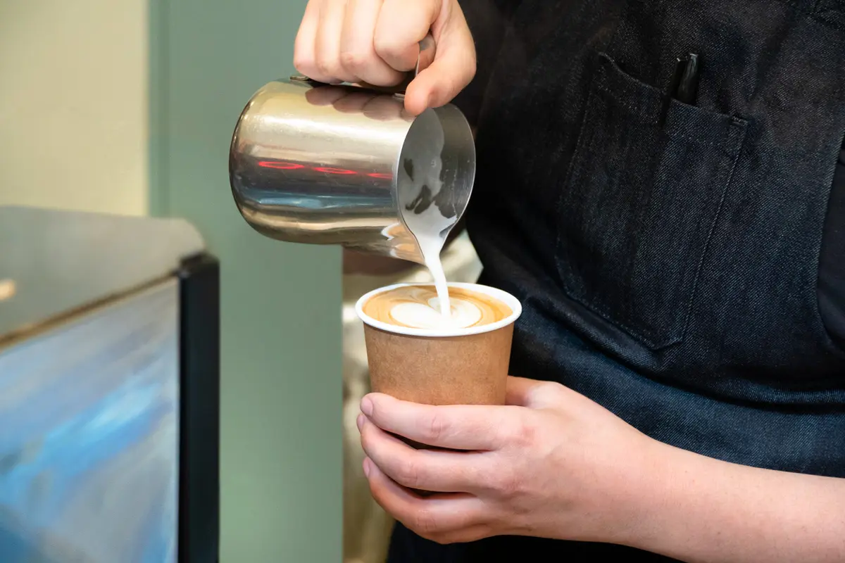 barista pouring coffee on clement street san francisco