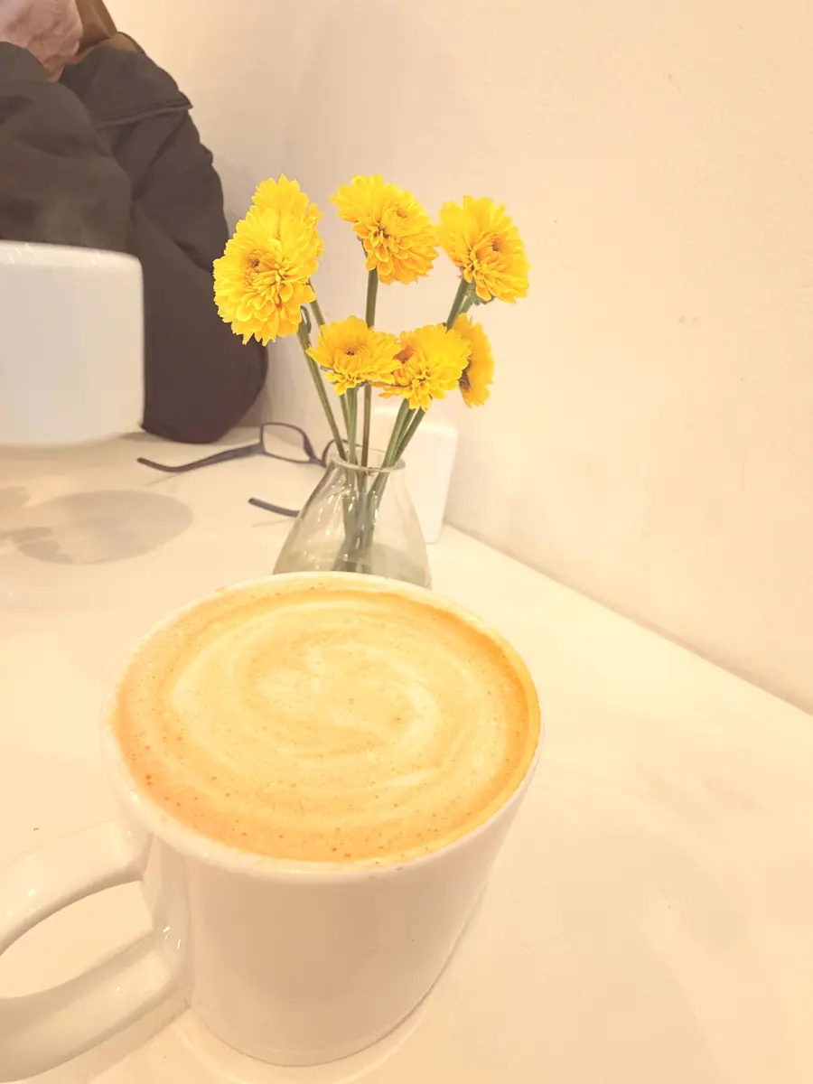 cup of coffee and yellow flowers sacramento street san francisco