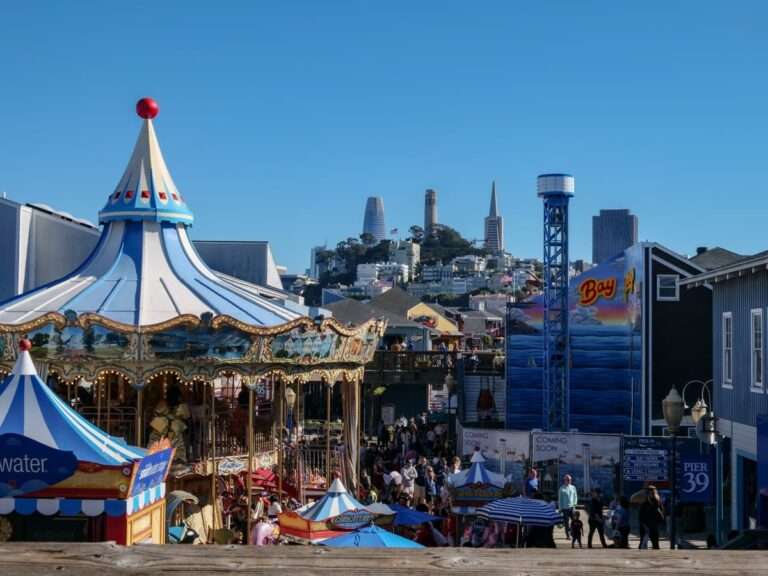 pier 39 with shops and merry-go-round is busy but fun neighborhood for families visiting San Francisco
