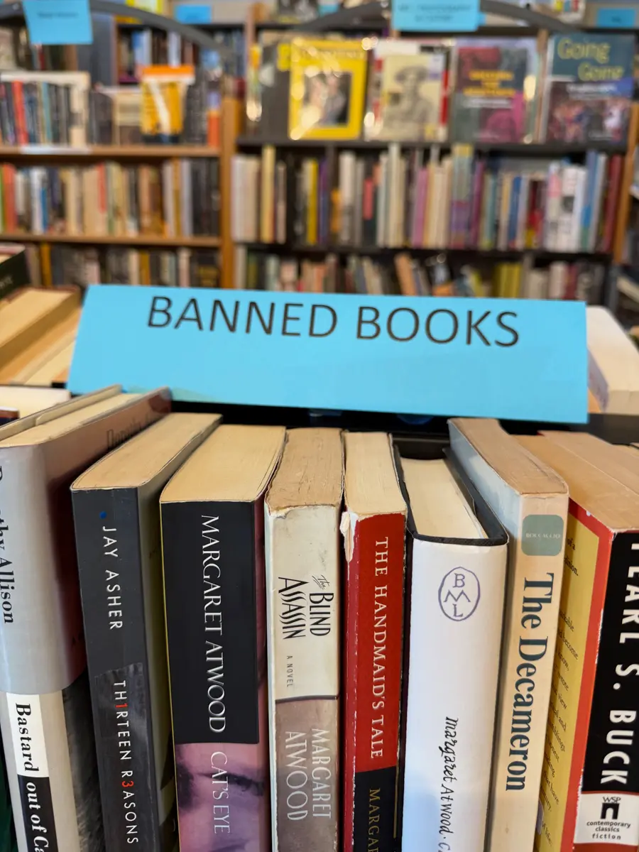 a rack of books with banned books in the haight ashbury neighborhood of san francisco