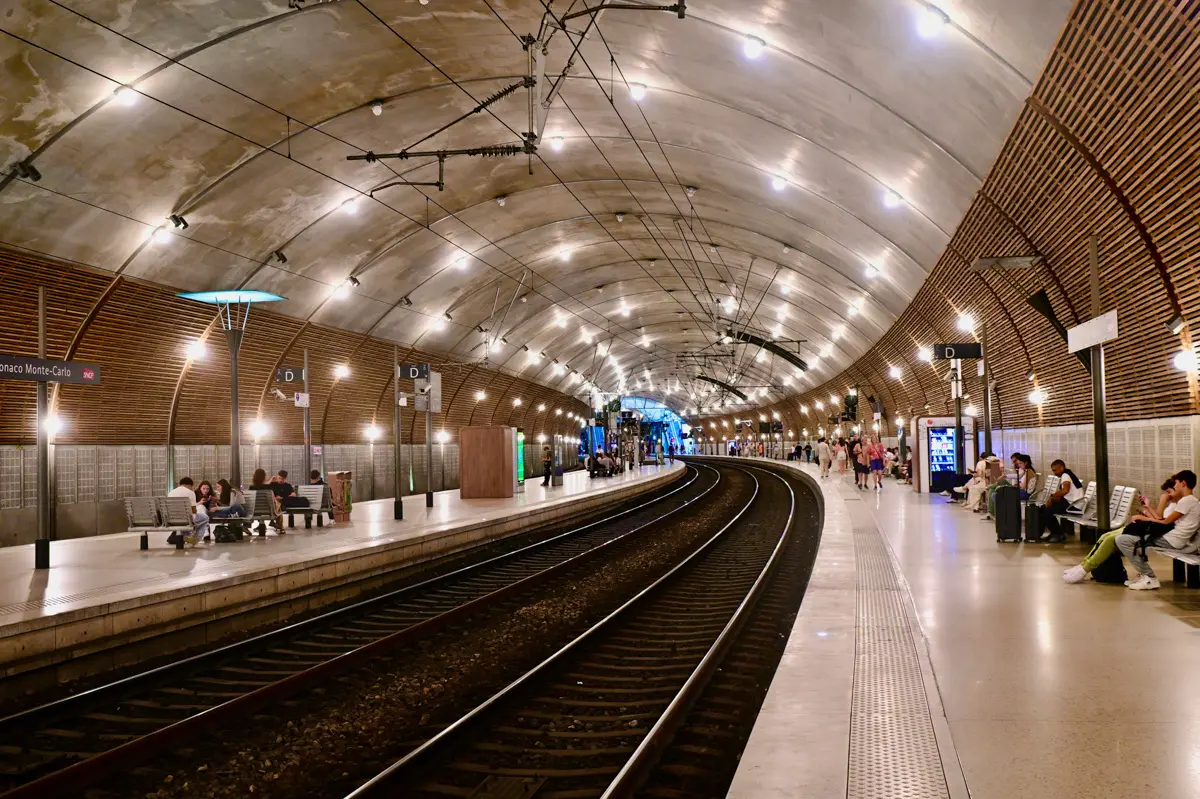 monaco train station with people waiting