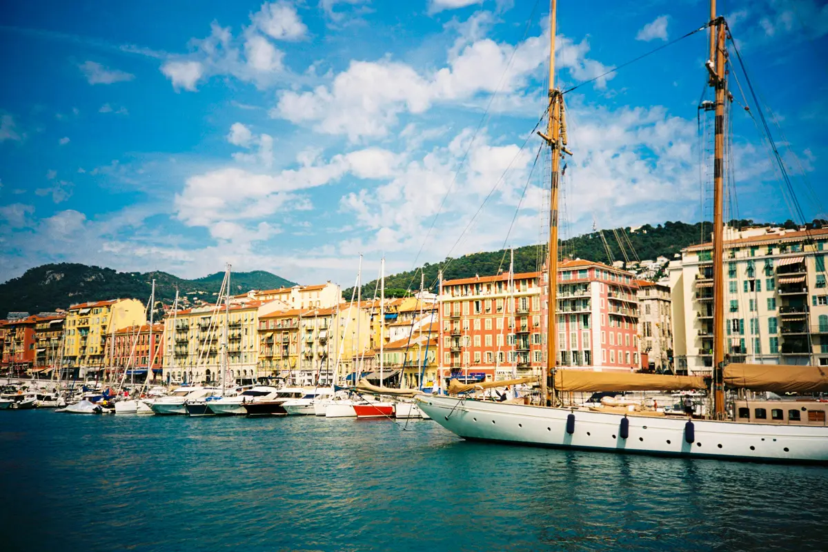 colorful french riviera harbor with boats