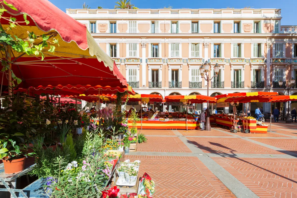 place des armes with stalls for the condamine market set up 