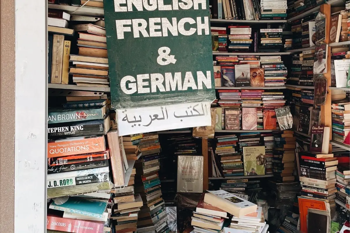 books in multiple languages sign