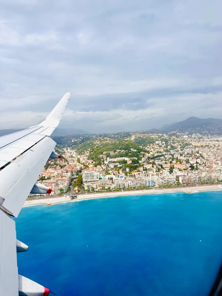 plane window looking over nice, france