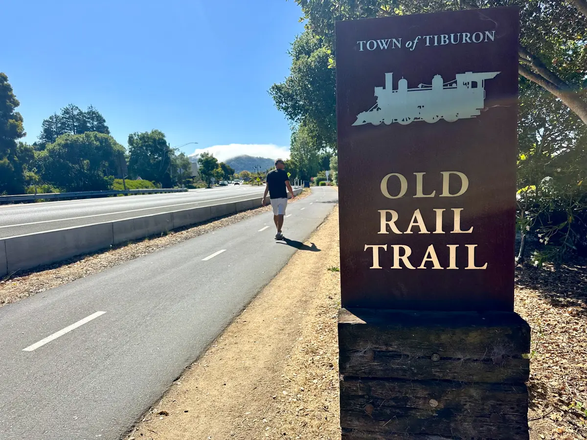 man walking on old rail trail in tiburon