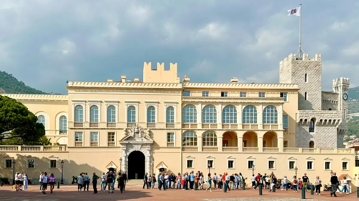 Prince's palace in monaco with people in the square
