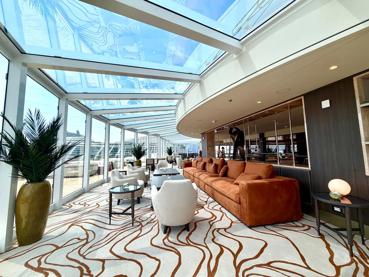 quite corner of explora lounge with modern decor and sky views