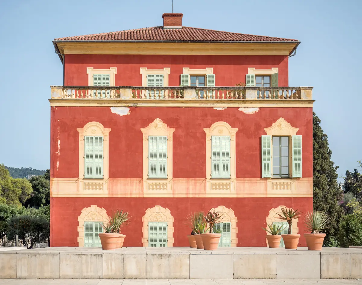 Matisse Museum's red facade in Nice, France