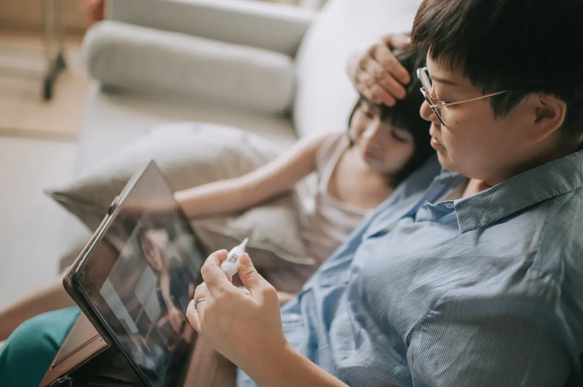 telemedicine session with father and child