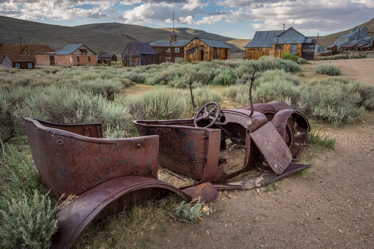 abandoned bodie ghost town with rusty car