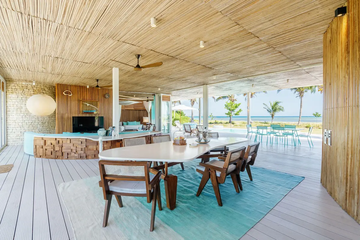 villa living room at Miavana with views to pool and ocean Photo by Oliver Fly Photography